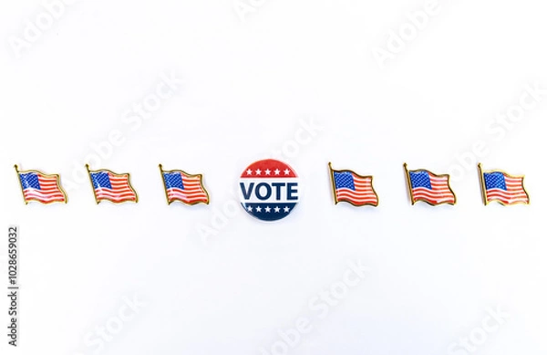 Fototapeta Vote button with American flag pins in horizontal arrangement placed in the center with six American flag pins symmetrically aligned in a horizontal row on a white background. importance of civic duty