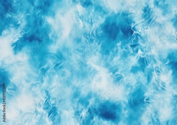 Fototapeta Blue and white abstract tie-dye texture with soft patterns.
