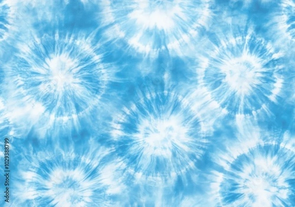 Fototapeta Soft blue tie-dye pattern with multiple circular bursts.
