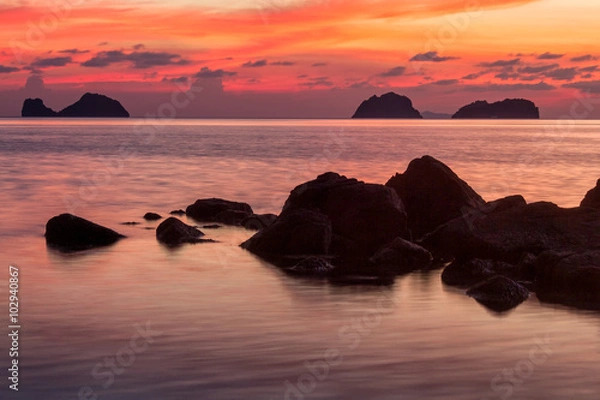 Obraz Colored sunset over the tropical sea, stones and cliffs 