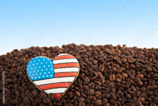 Fototapeta close view at gingerbread heart shaped and coffee beans