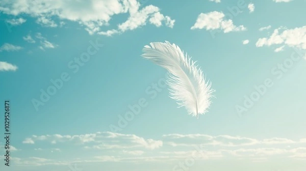 Fototapeta   A white feather drifts in the azure sky, surrounded by fluffy, cotton-like clouds