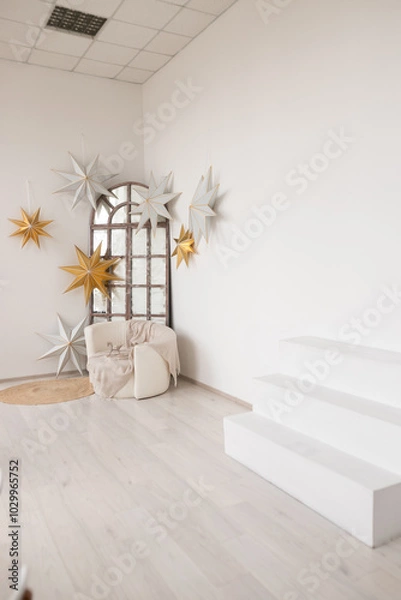 Obraz Bright and airy interior showcasing decorative stars in a minimalist space, perfect for cozy gatherings and festive occasions