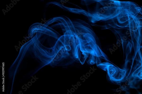 Fototapeta Blue smoke on black background