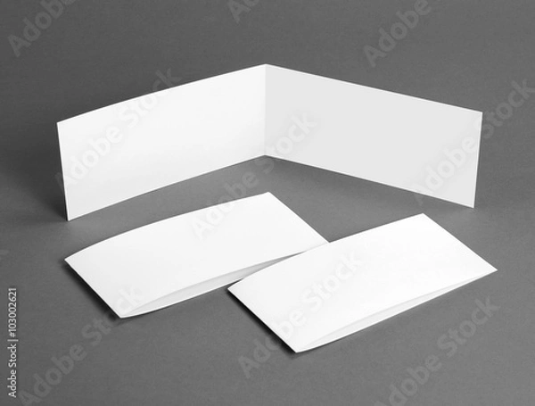 Fototapeta White empty closed card on grey to replace your design.