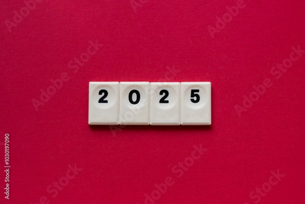 Obraz chips with numbers 2025 on red background