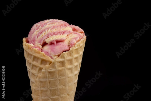 Fototapeta waffle cone with ice cream and pieces of melon and watermelon