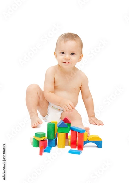 Fototapeta baby playing with color blocks