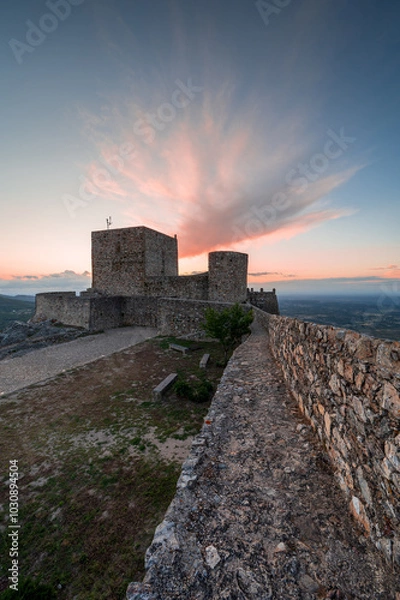 Fototapeta Amazing Sunset at Castle Marvao, a small picturesque village in the Alentejo. Panoramic view landscape. Beautiful landmark in Portugal, with its historic walls and towers.