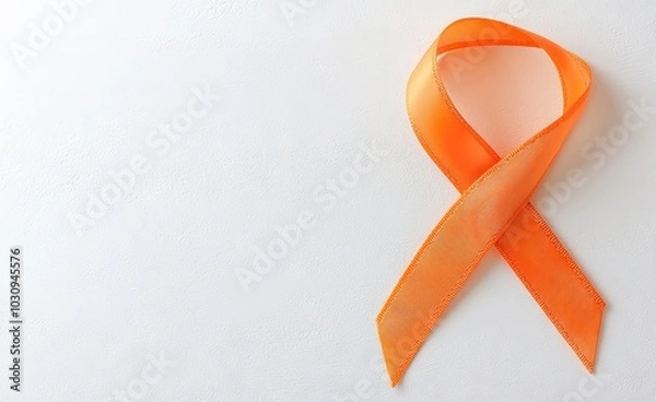 Fototapeta A ribbon with an orange color on a white background depicts an image of kidney cancer
