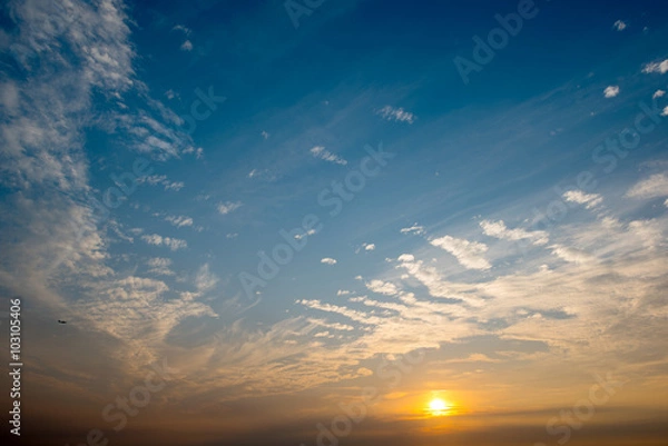 Obraz Evening sky with clouds and sun