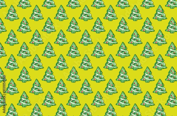 Fototapeta Pattern of christmas tree cookies on yellow pastel background