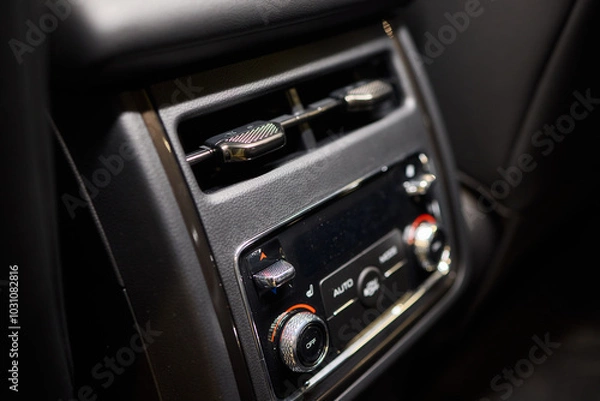 Fototapeta A close up of a car s rear air conditioning system