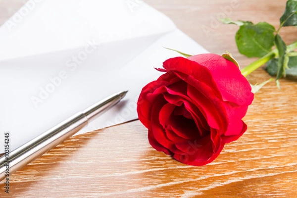 Fototapeta love letter envelope and red rose