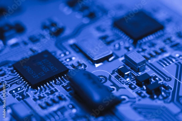Fototapeta Electronic circuit - blue computer board with chips