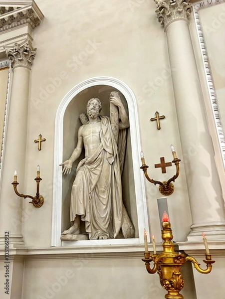 Fototapeta Sculptures of apostles and saints are placed in the niches of the walls of the Basilica of Saint Marin as if they are listening to your silent confession and forgiving your sins.