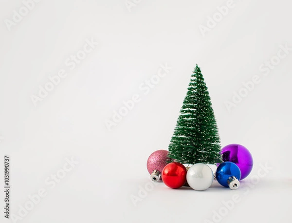 Obraz Christmas tree with multicolored decoration ormanents isolated on white background. Holiday concept.