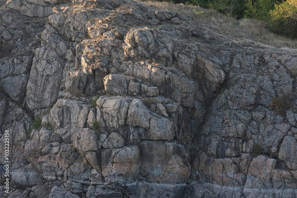 Fototapeta A stunning view of rocks displaying natural textures and patterns, set against a serene and tranquil backdrop