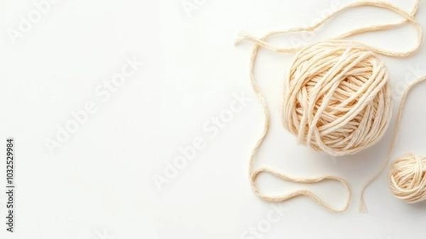 Fototapeta A macro shot of wool yarn knitted into a complex pattern, with fibers clearly defined on a white backdrop.