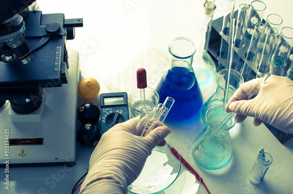 Fototapeta Medical or chemistry science background with microscope