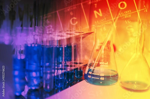Fototapeta science laboratory test tubes with periodic table background