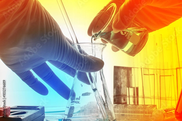 Fototapeta science laboratory test tubes with periodic table background