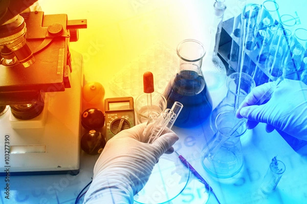 Fototapeta science laboratory test tubes with periodic table background