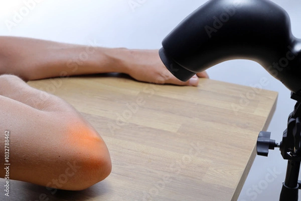 Fototapeta Therapeutic lamp for light rehabilitation, improving the condition of inflamed joints and more