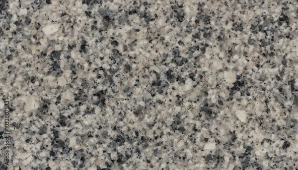 Fototapeta Granite stone texture with a speckled pattern in various shades of gray and black
