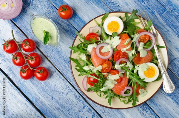 Fototapeta Smoked salmon salad with arugula, tomatoes, eggs and red onion