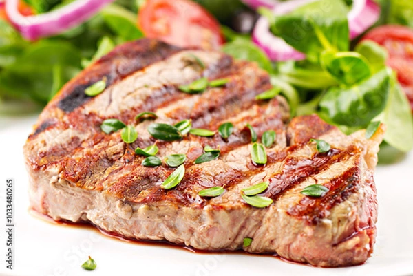 Fototapeta Fillet of beef with salad