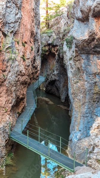 Fototapeta The cliffs and trails that make up the Calomarde Footbridges reveal a unique natural environment, where water and rock come together in a magical corner of the Sierra de Albarracín.
