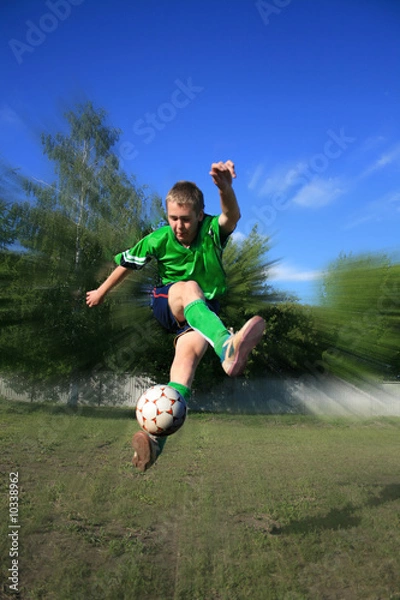 Fototapeta Young soccer player
