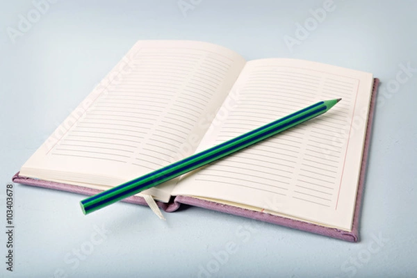 Fototapeta opened notebook on the table