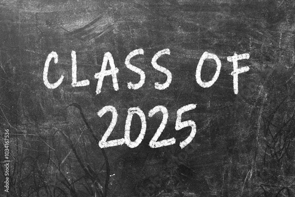Fototapeta Welcome class of 2025 - chalkboard sign design. An apple and a pencil on either side. A fresh new start of a new school year. Graduation class. Background and poster sign. Chalk writing and drawing.