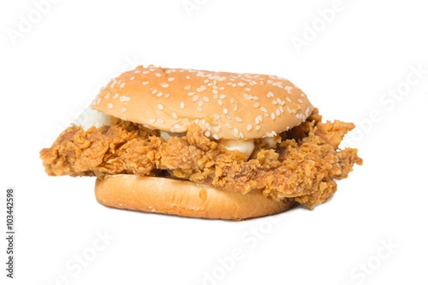 Obraz Crisp chicken burger with lettuce isolated on white