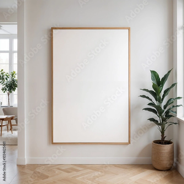 Obraz Frame Mockup. Modern Scandinavian minimalist interior with large blank frame on the wall and potted green plant in a woven basket natural light clean design wooden floor and subtle decor