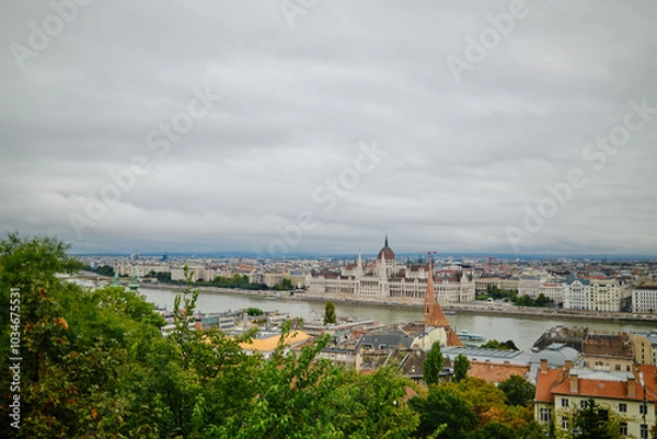 Fototapeta The Hungarian parliament in Budapest from  far away