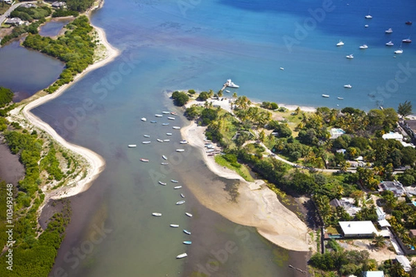 Fototapeta Helicopter flight above the island of Mauritius. Photo shows the south coast.