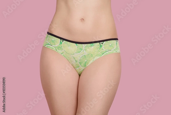 Fototapeta Slim woman's body isolated over pink background