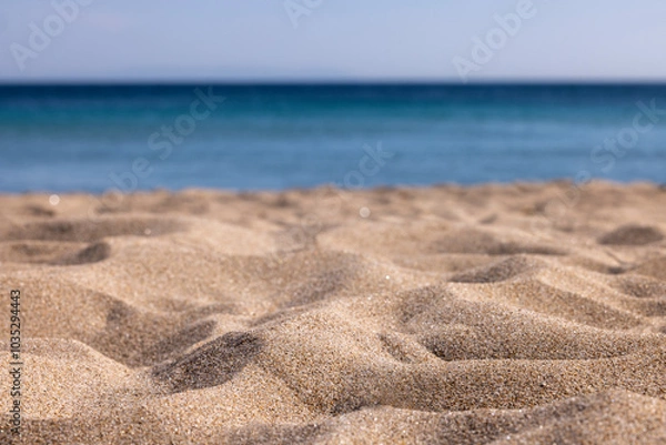 Obraz Beach, sea and sky. Close-up of beach and sand, blue sea and sky, empty ground, no people. Suitable for product placement. For manipulation and photomontage