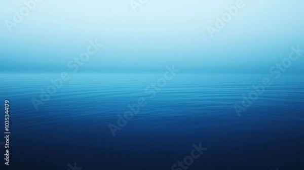 Fototapeta serene blue gradient background that transitions from a deep navy at the top to a soft sky blue at the bottom.