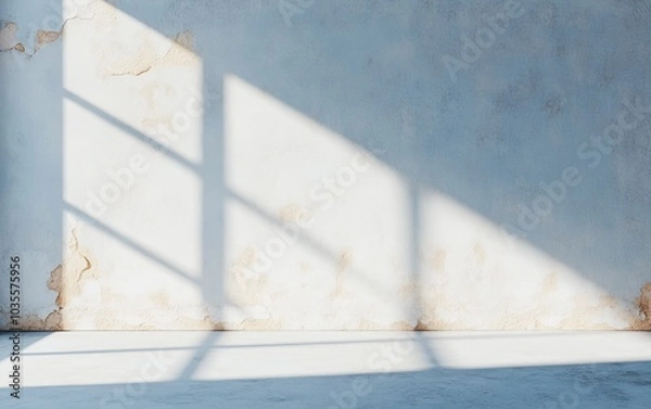 Obraz Abstract interior space with sunlight casting shadows on a textured wall.