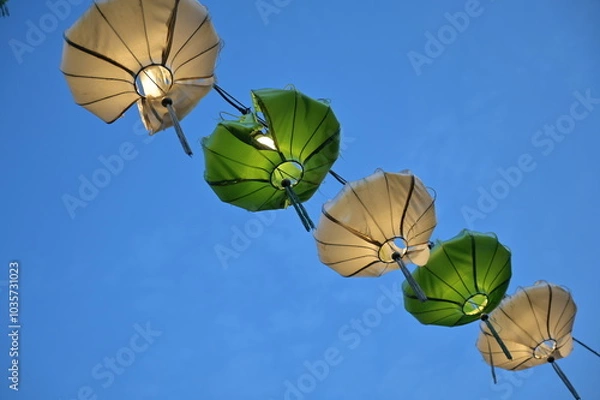 Fototapeta ancient, color, green, festive, bright, colorful, cloudless, blue sky, hoi an vietnam, vietnam, lantern, retro, white, sky lantern, tradition, paper, effect, creative, celebrate, sky, space, candle, l