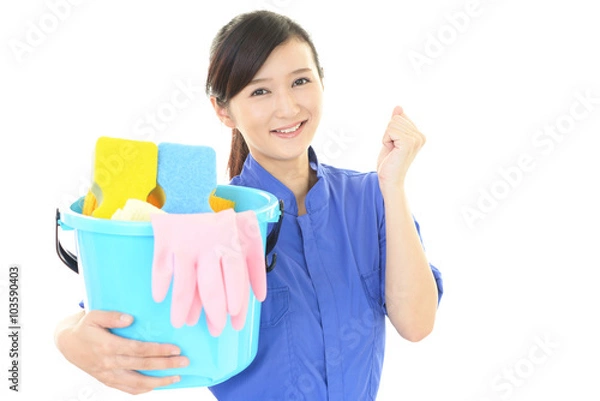 Fototapeta ガッツポーズの女性清掃員
