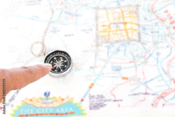 Obraz hand holding a compass