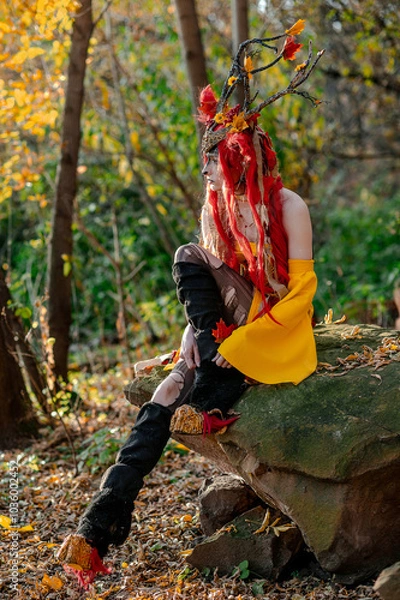 Fototapeta Deer girl in the autumn forest