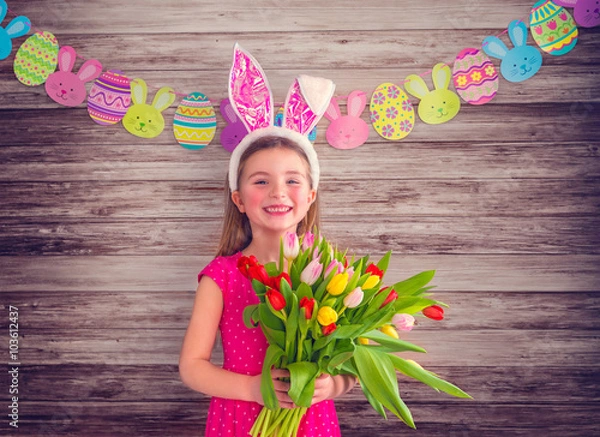 Fototapeta Mädchen mit Blumenstrauß zu Ostern