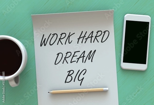 Fototapeta Work Hard Dream Big, message on paper, smart phone and coffee on table