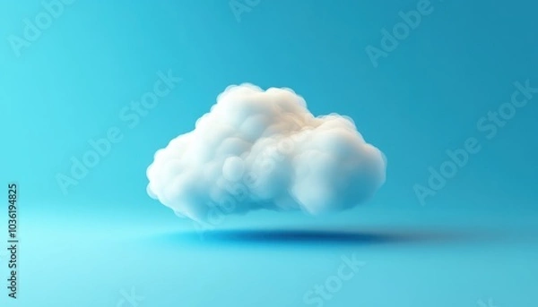 Fototapeta A fluffy white cloud floating against a soft blue background in bright daylight
